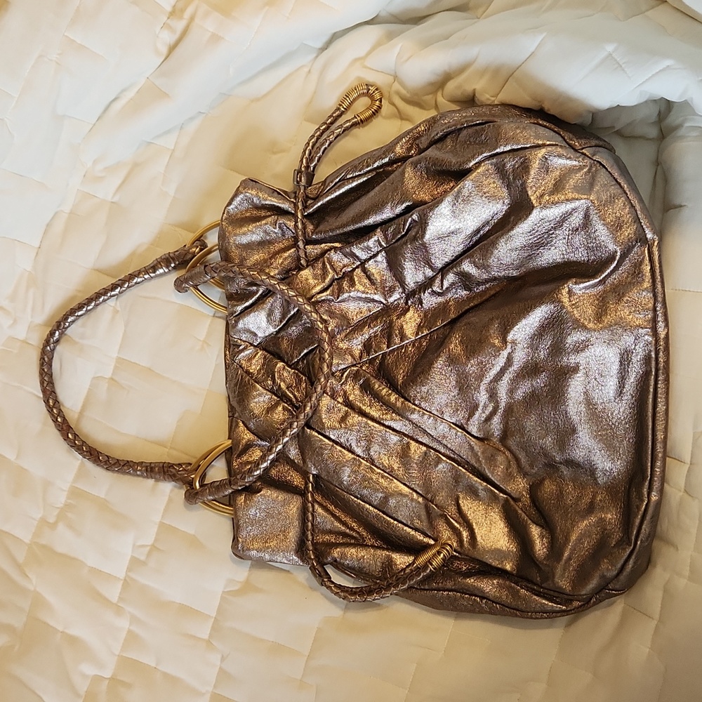 Elliott Lucca rose gold color made of pig skin bag